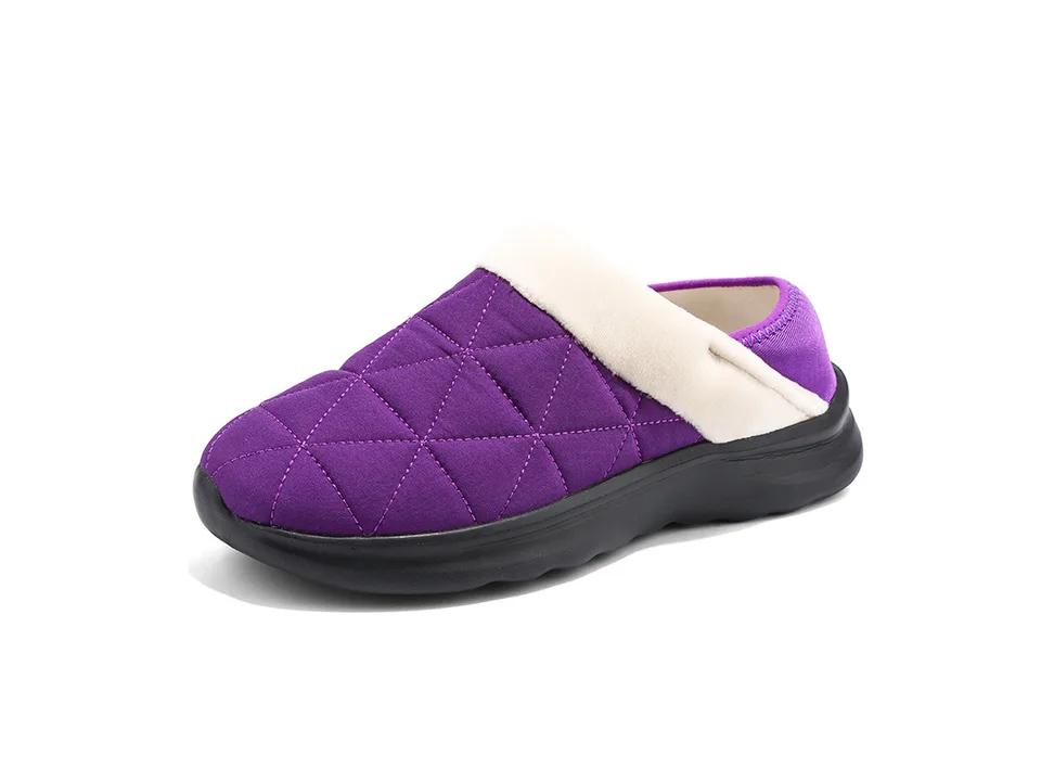 Purple quilted indoor slipper with a white fleece lining.