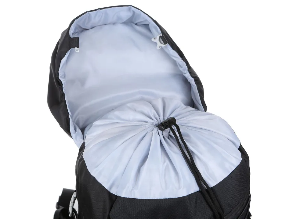 Open top of the backpack showing the drawstring closure and internal lining.
