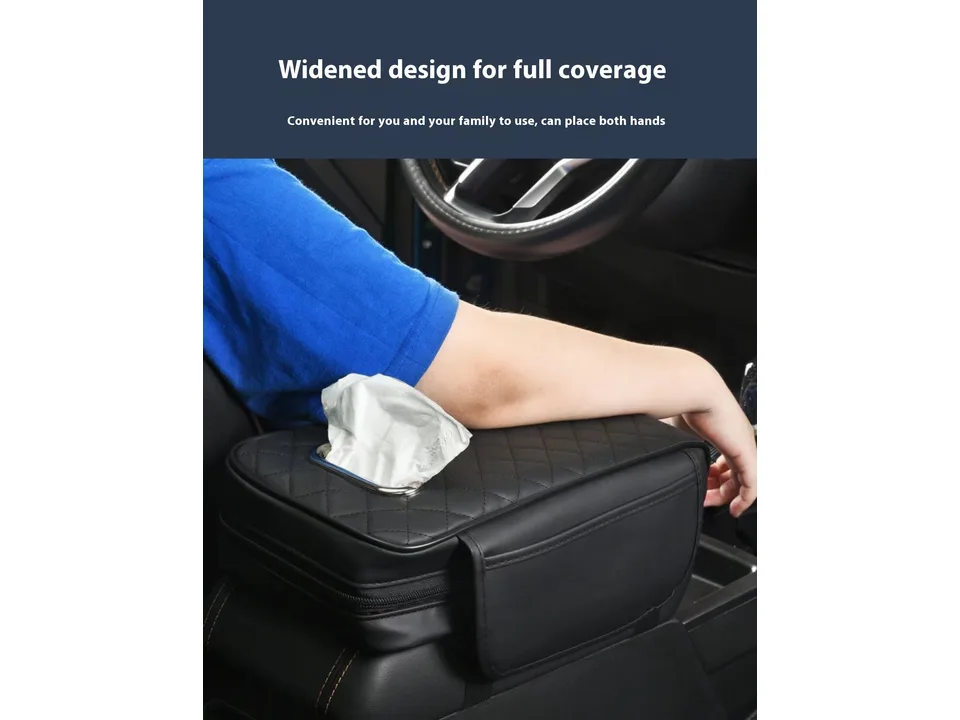 Person resting their arm on the car armrest pad while driving.