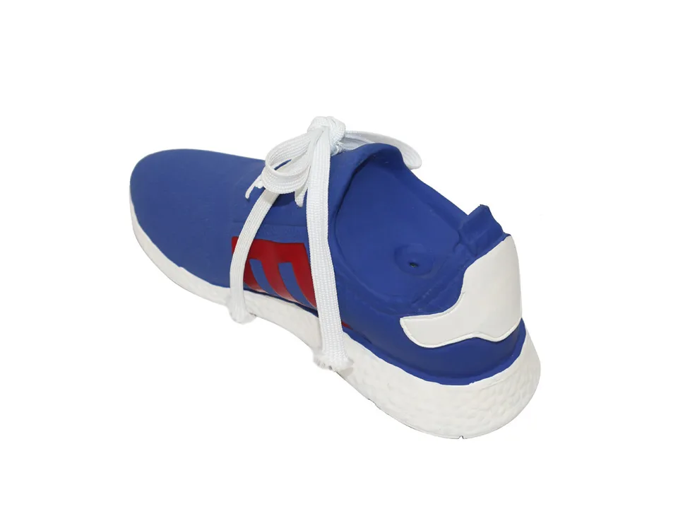 A blue shoe-shaped dog toy with red accents.