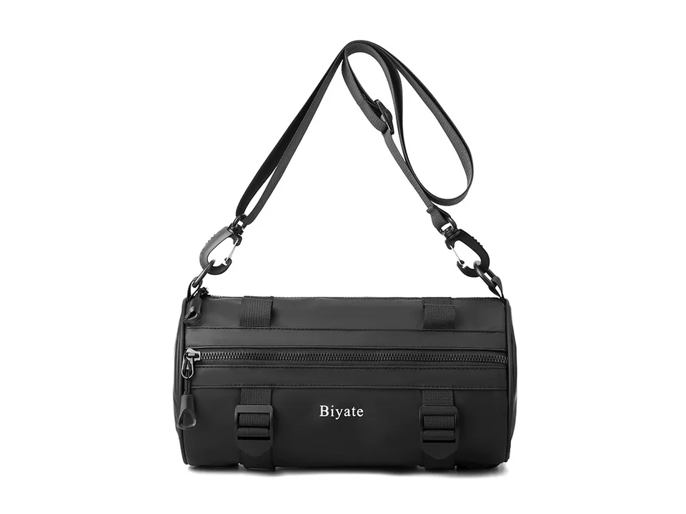 Black cylindrical crossbody bag with adjustable strap and front zipper pocket.