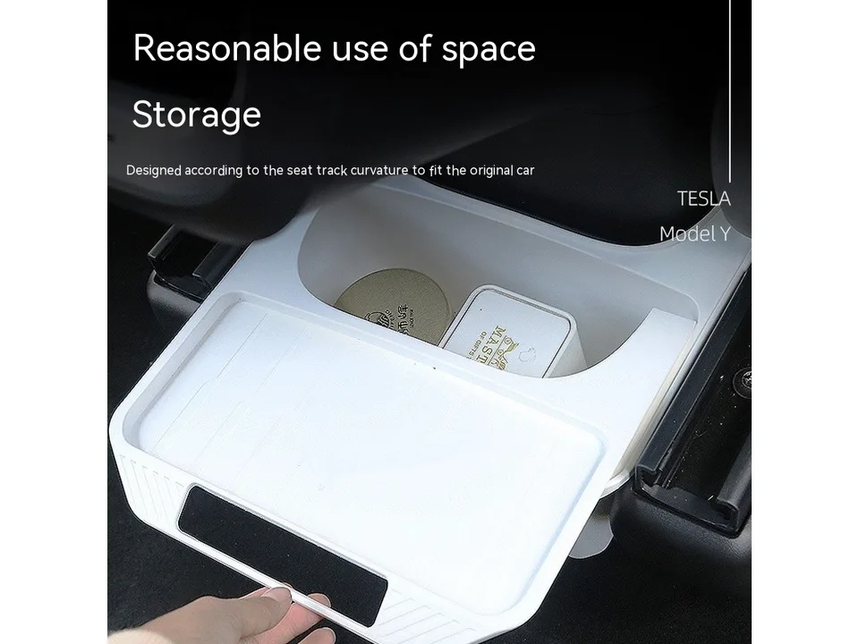 White car storage box installed under a seat in a Tesla Model Y