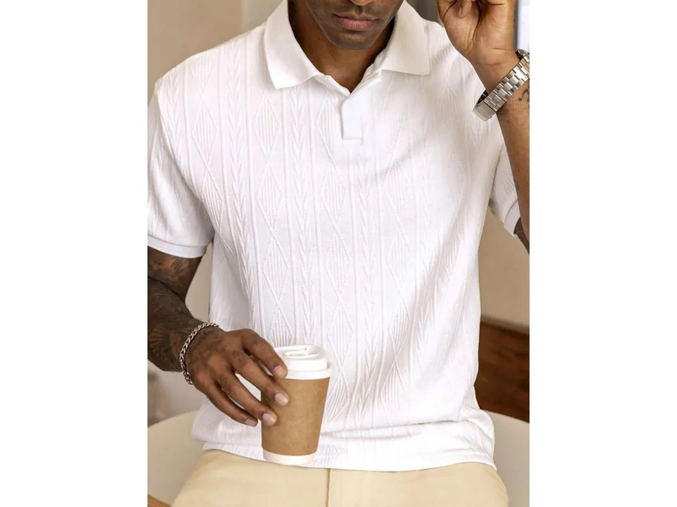 A man wearing a white short-sleeve jacquard knit polo shirt.