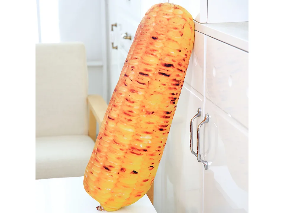 A single roasted corn plush pillow standing upright.