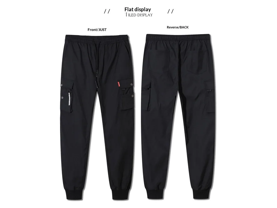 Front and back view of black cargo jogger pants laid flat.