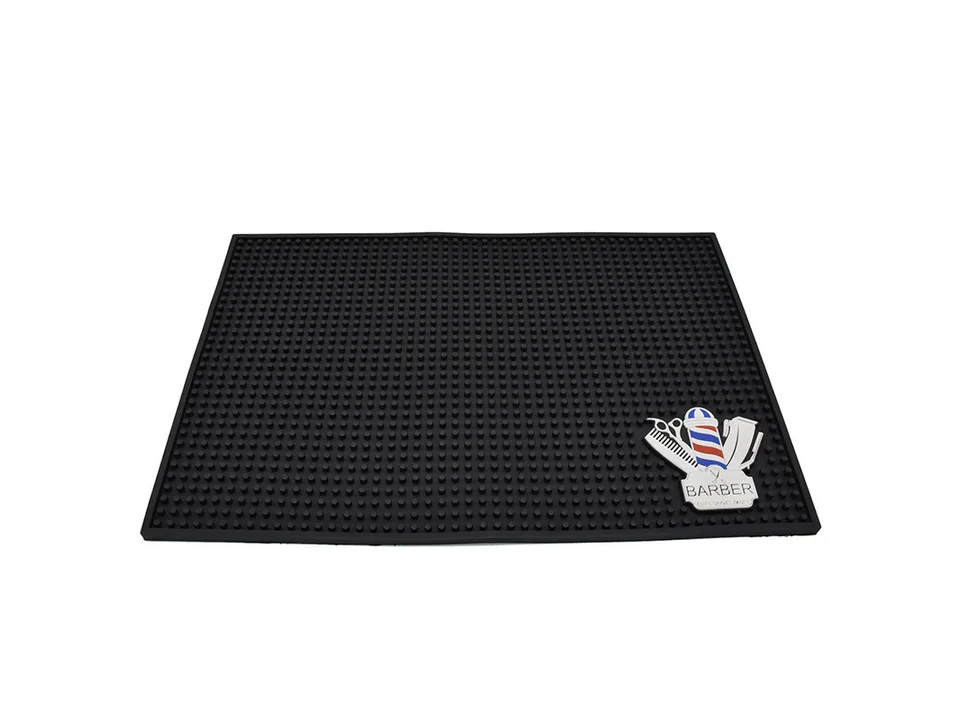 Black rubber barber station mat with a barber pole logo.