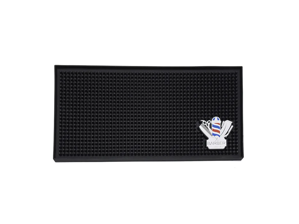 Top view of a black rectangular barber station mat.