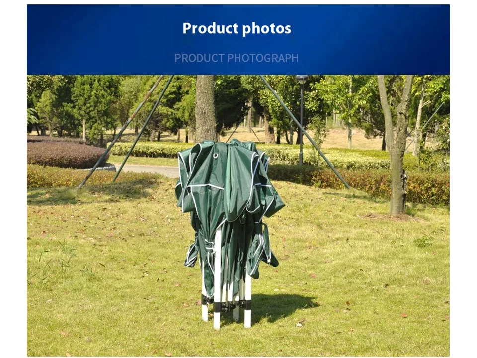 A folded green pop-up canopy tent standing in a park.