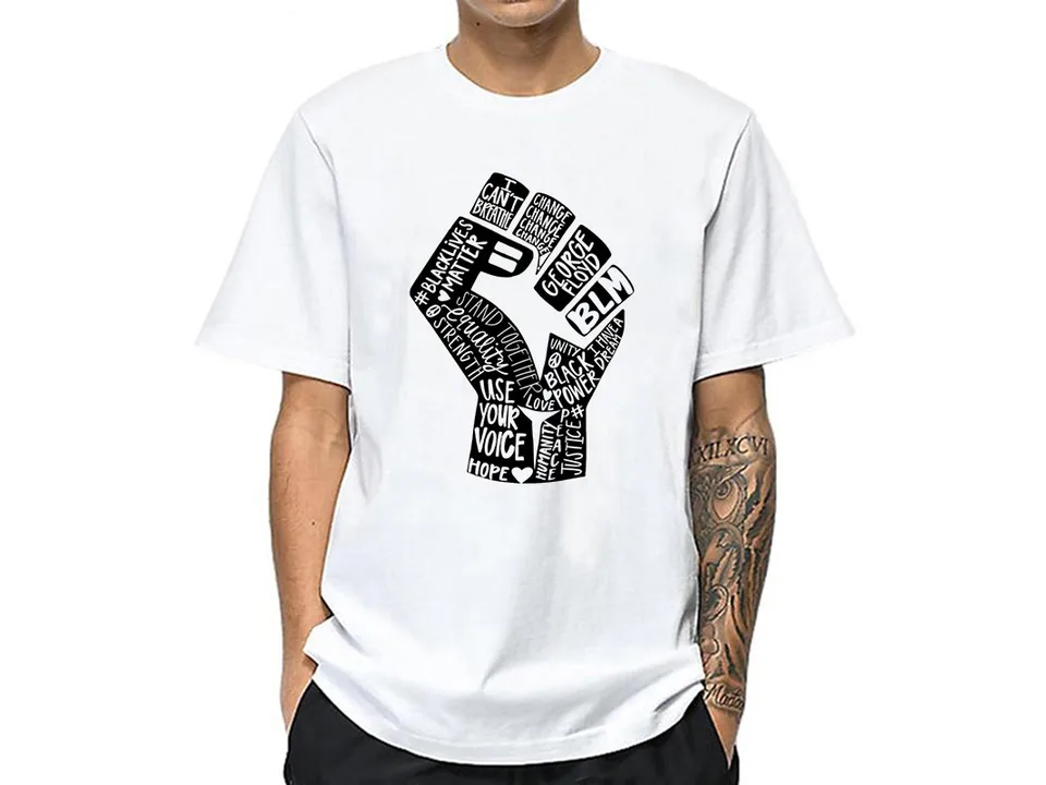 A man wearing a white t-shirt with a black graphic print of a fist.