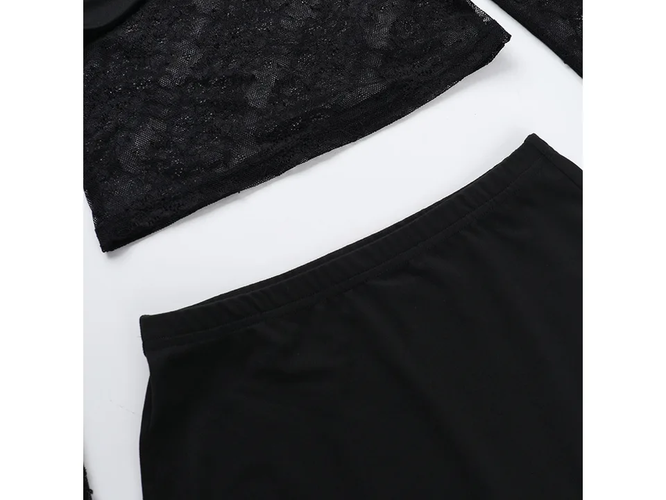 Flat lay view of the black lace top and mini skirt.
