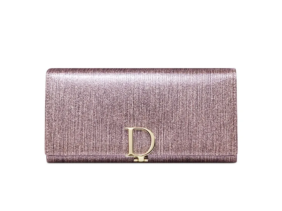 A glittery pink wallet with a gold D-shaped buckle closure.