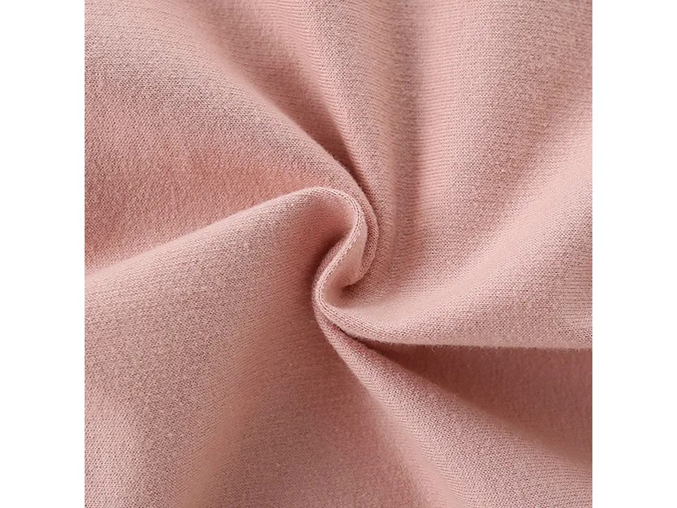 Close-up view of the pink sweatshirt fabric texture.