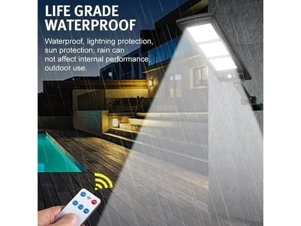 Solar wall lamp mounted on a house exterior during a rainstorm.