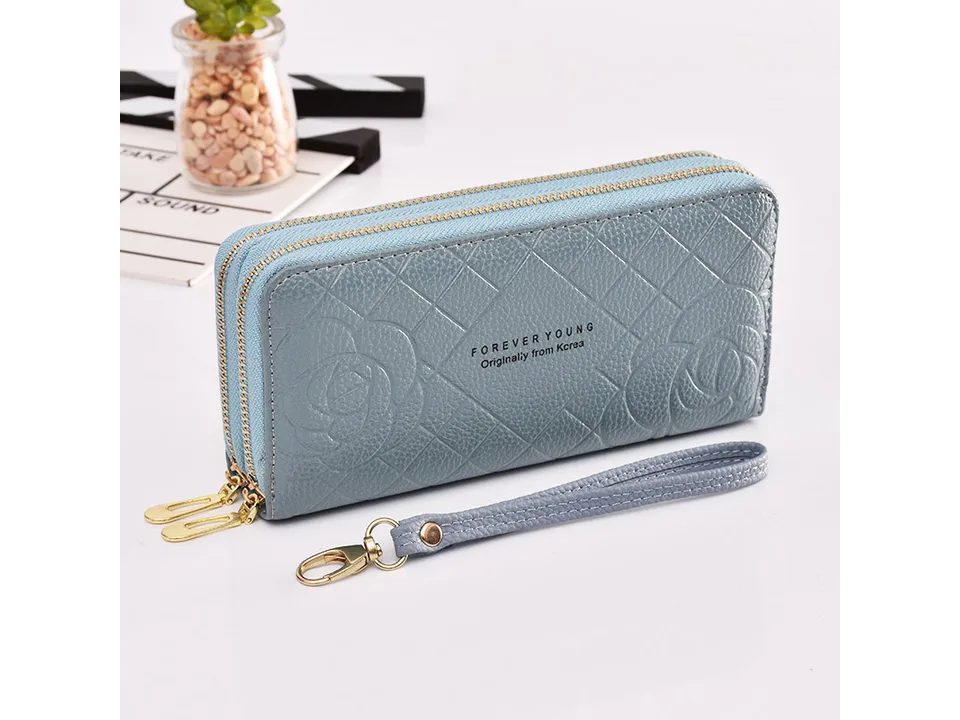 Blue women's double zipper clutch wallet with floral pattern and wrist strap.