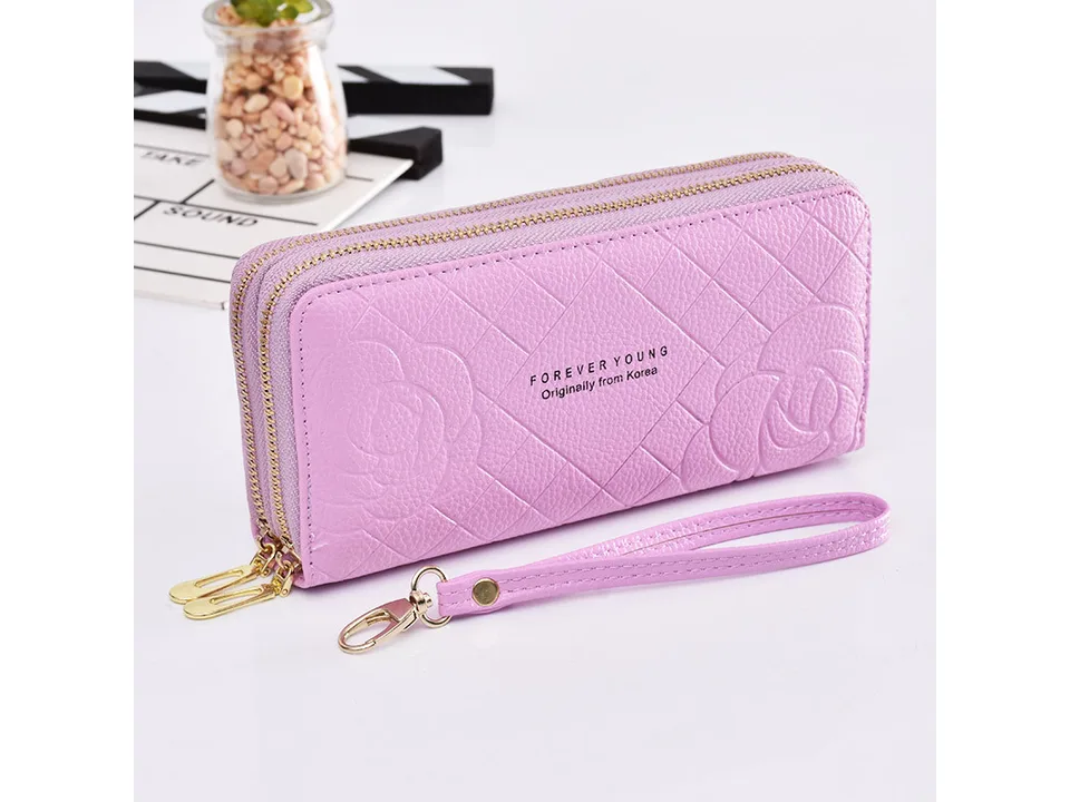 Light purple women's double zipper clutch wallet with floral pattern and wrist strap.