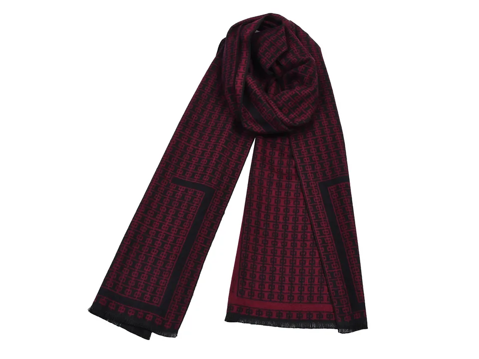 A red and black patterned scarf with tassels.