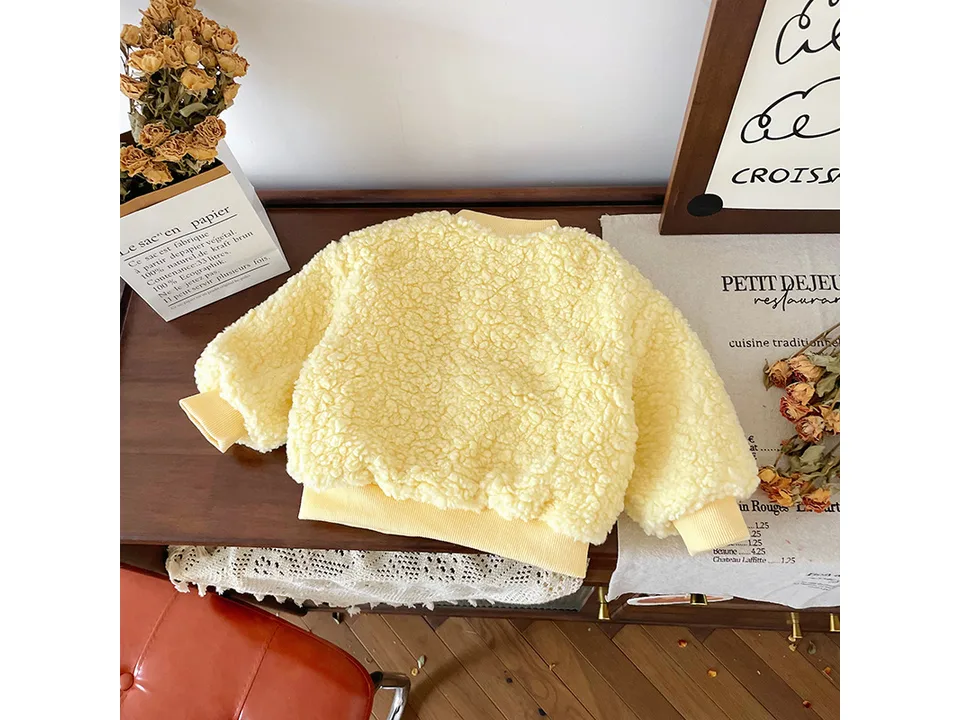 Back view of the yellow fleece children's coat.