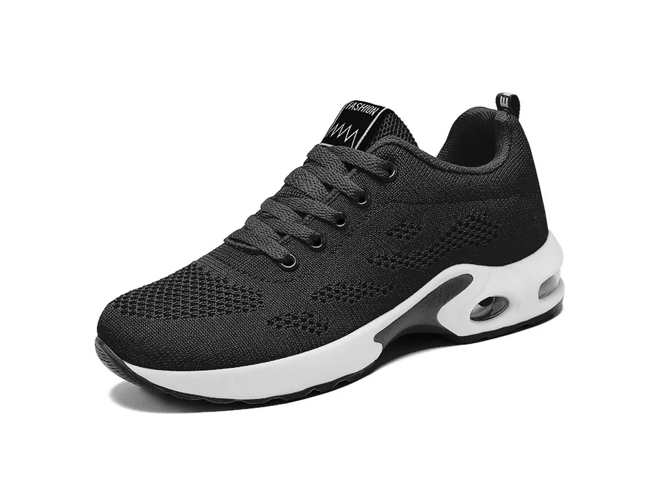 A black women's athletic sneaker with a white sole.