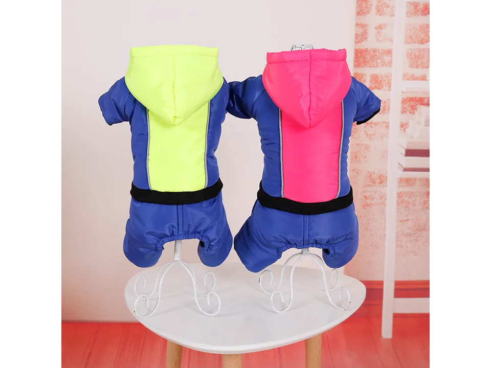 Two dog jumpsuits with hoods, one with a neon yellow back panel and one with a pink back panel.