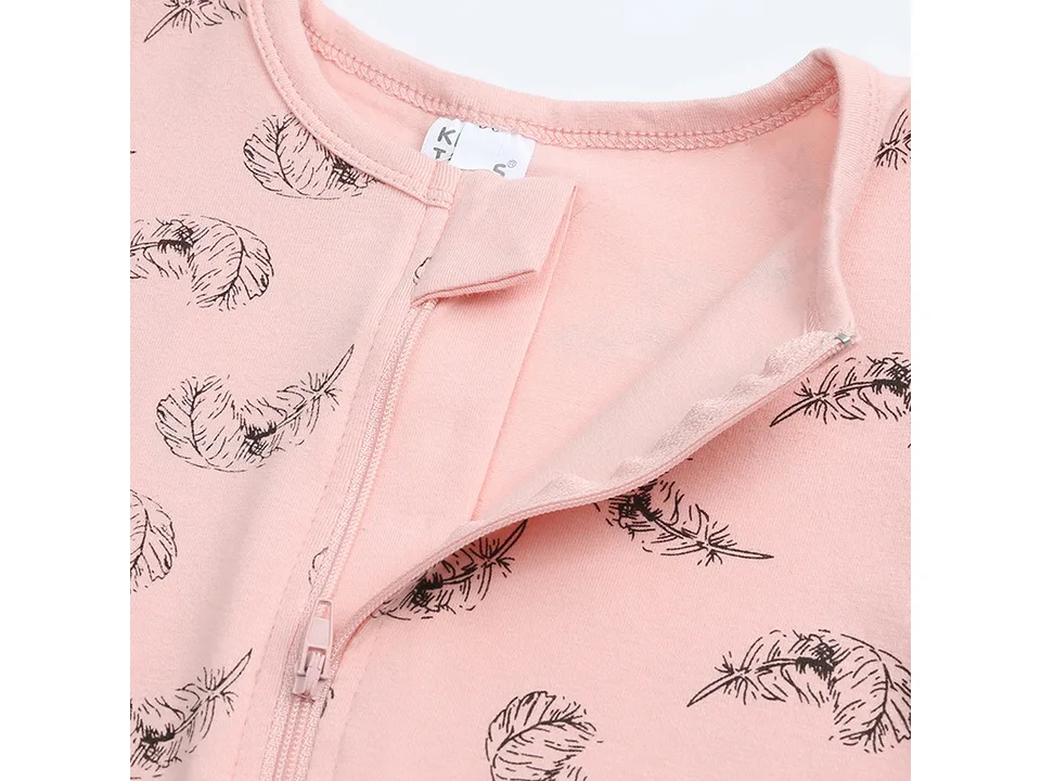 Close-up of the neckline and zipper top on the baby jumpsuit.