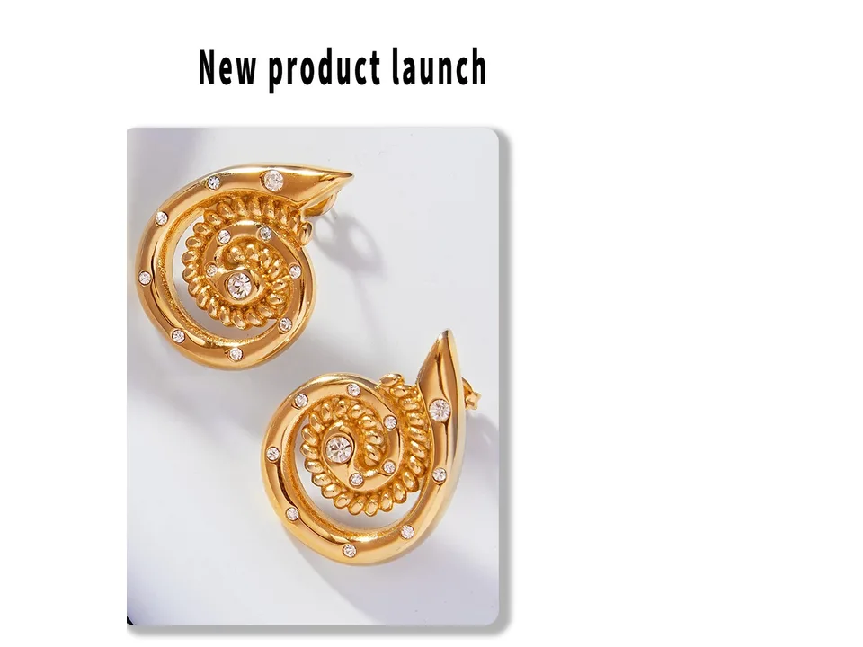 Gold spiral stud earrings with rhinestones