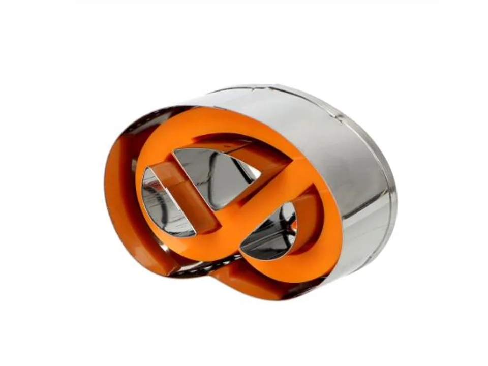 A single pretzel-shaped cookie cutter with an orange insert.