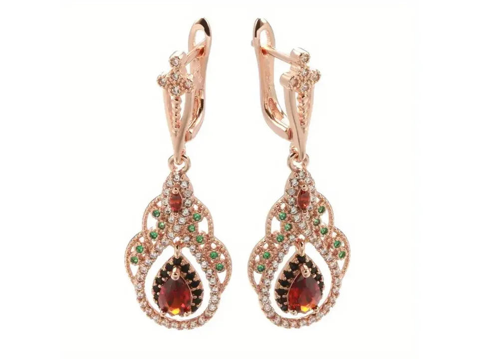 Front view of two rose gold bohemian drop earrings with red, green, and clear cubic zirconia stones.