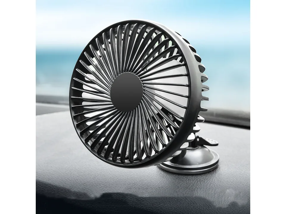 Black car fan mounted on a car dashboard.