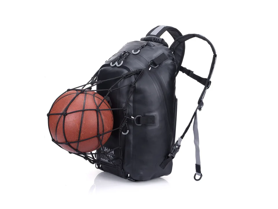 Black motorcycle backpack with a basketball secured in the external helmet net.