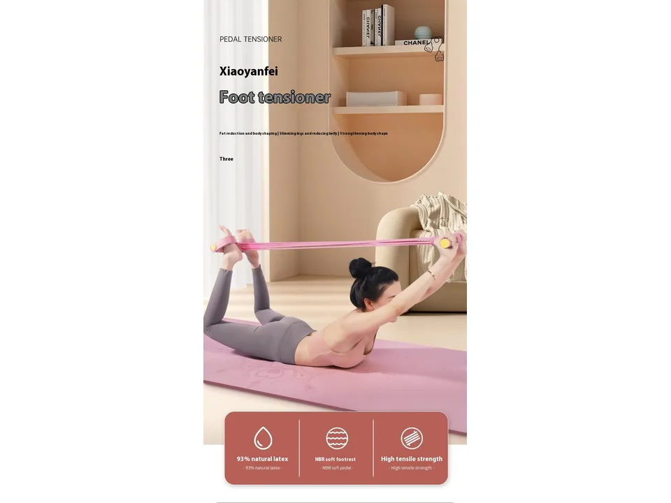 A woman using the pedal resistance band for a full-body stretch on a yoga mat.