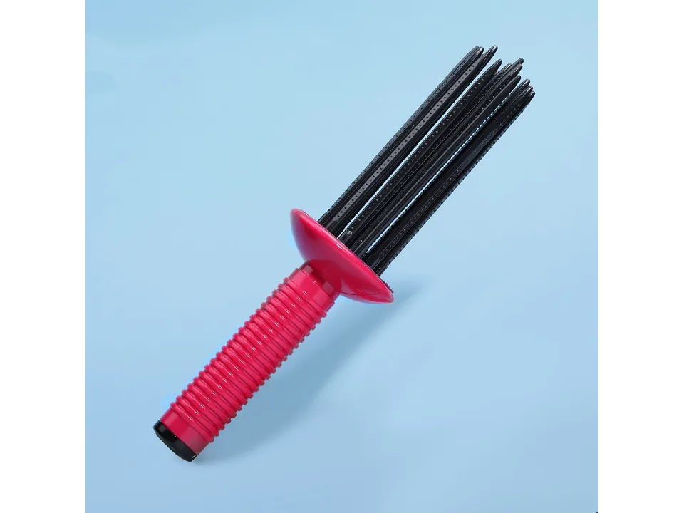 The hair styling brush with a pink handle and black bristles on a blue background.