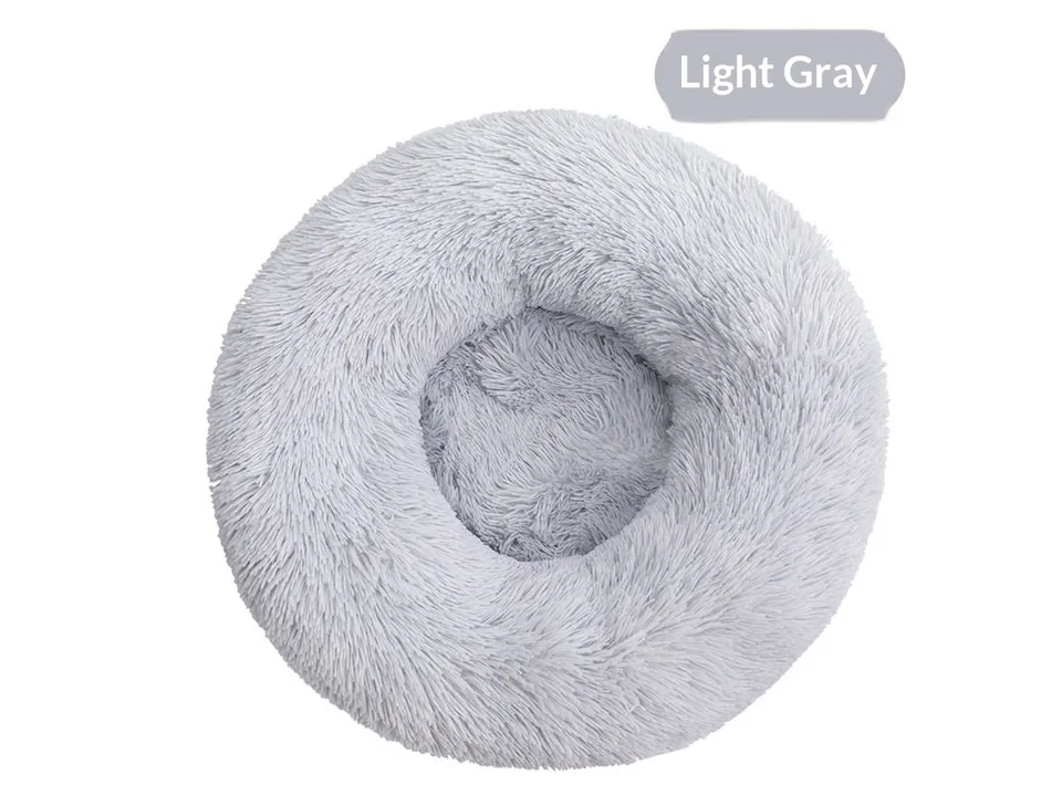 Round plush pet bed in light gray