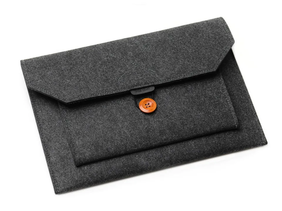 The closed felt laptop sleeve with an orange button closure.