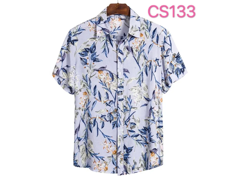 Men's short sleeve button-down shirt with a blue and white leaf print on a light purple background.