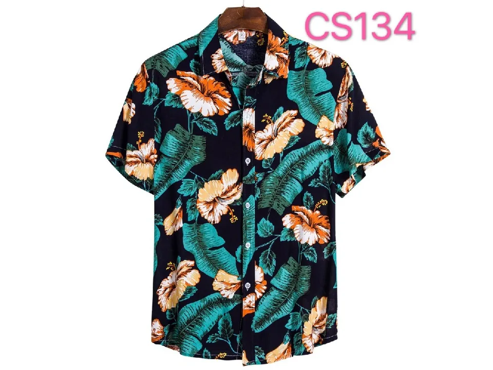 Men's short sleeve button-down shirt with an orange and green tropical leaf print on a black background.