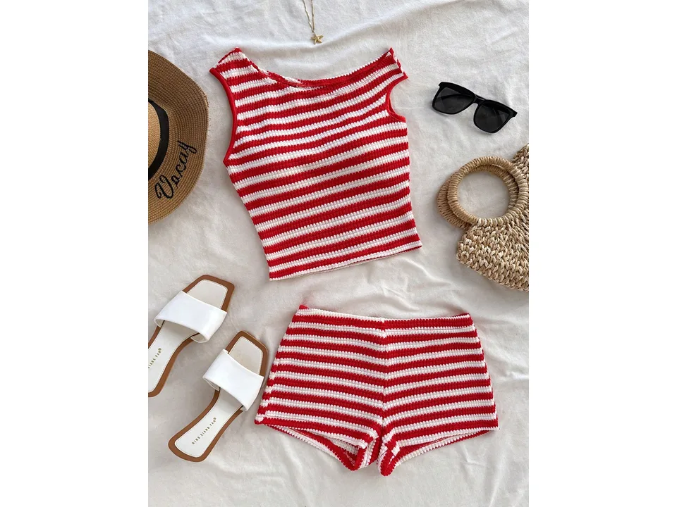 Red and white striped crop top and shorts set styled with a hat, sunglasses, and sandals.