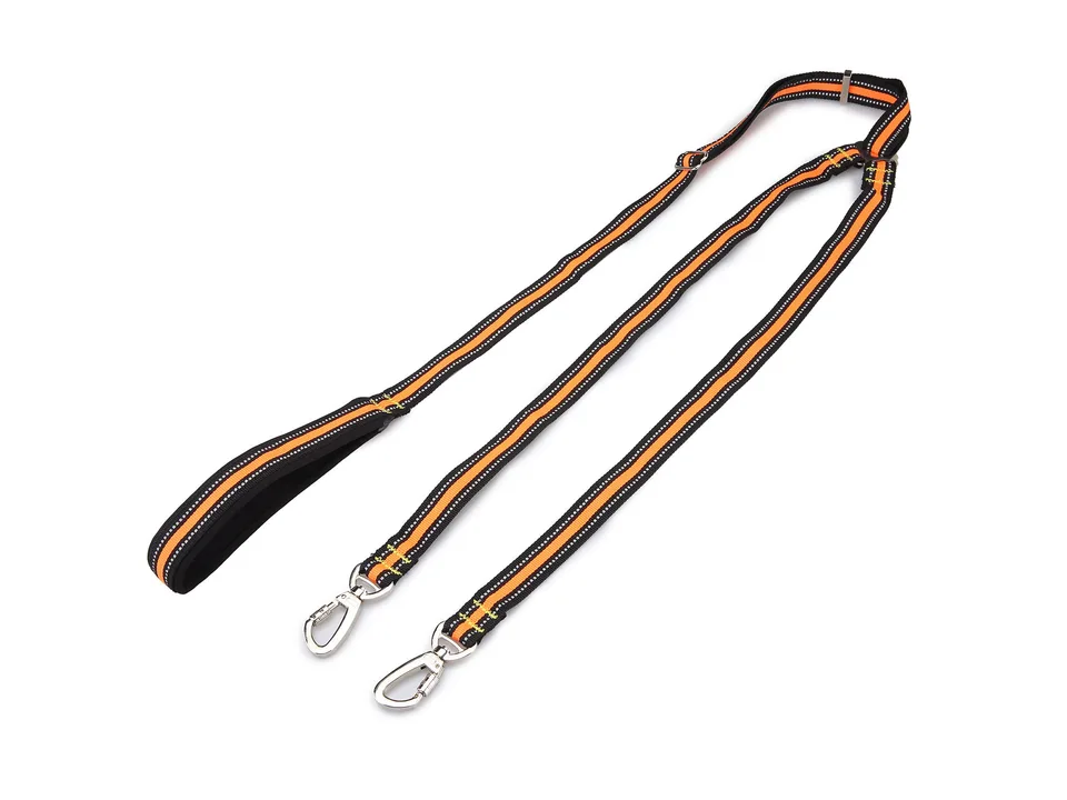 Adjustable double dog leash with orange and black reflective nylon straps and metal clips.