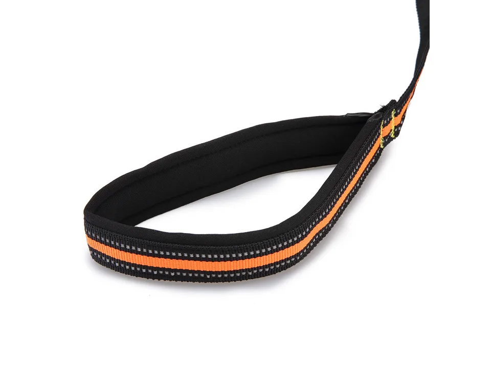 Close-up of the padded handle on the orange and black reflective dog leash.