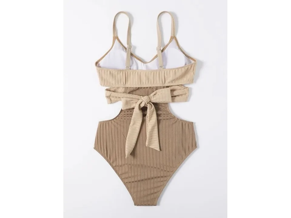 Back view of a beige and brown ribbed one-piece swimsuit with a tie detail.
