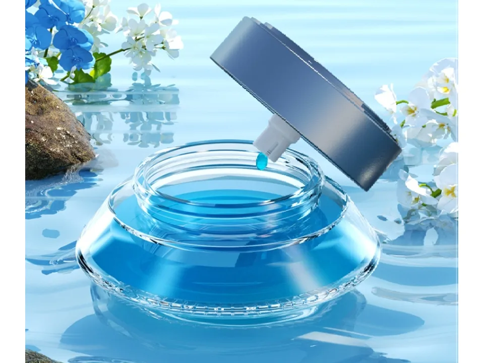 The car aromatherapy diffuser with the top cap removed, showing the internal mechanism.