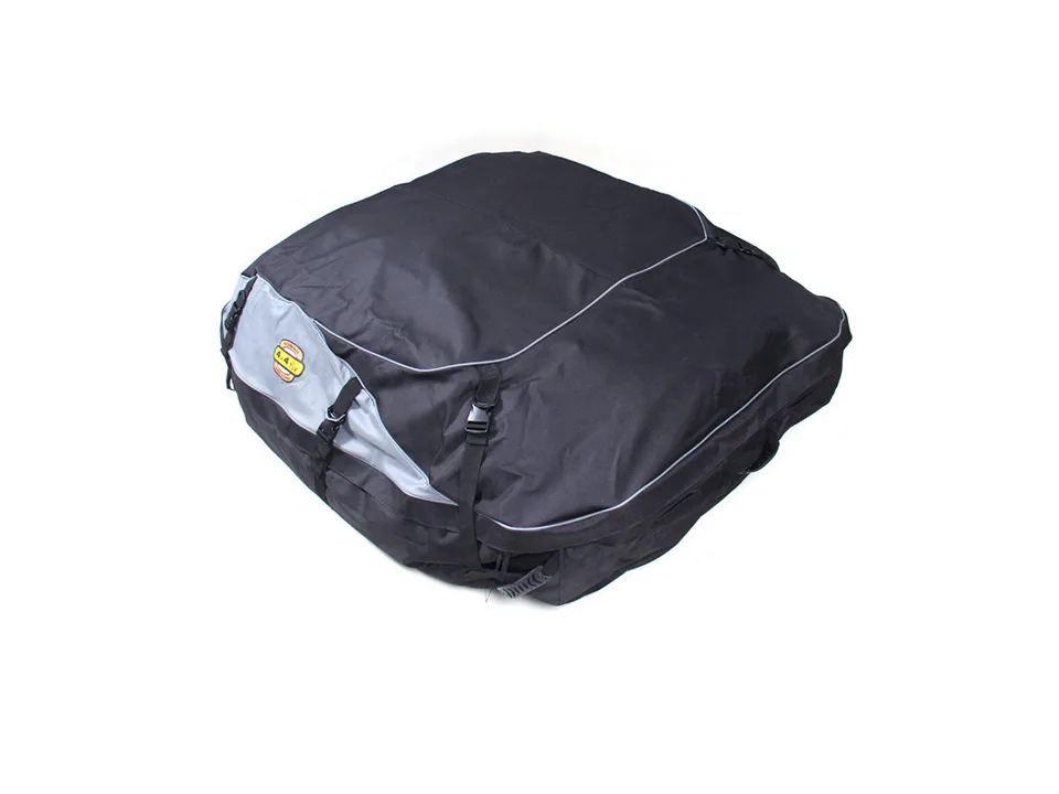 Black car roof top cargo bag with grey accents and straps.