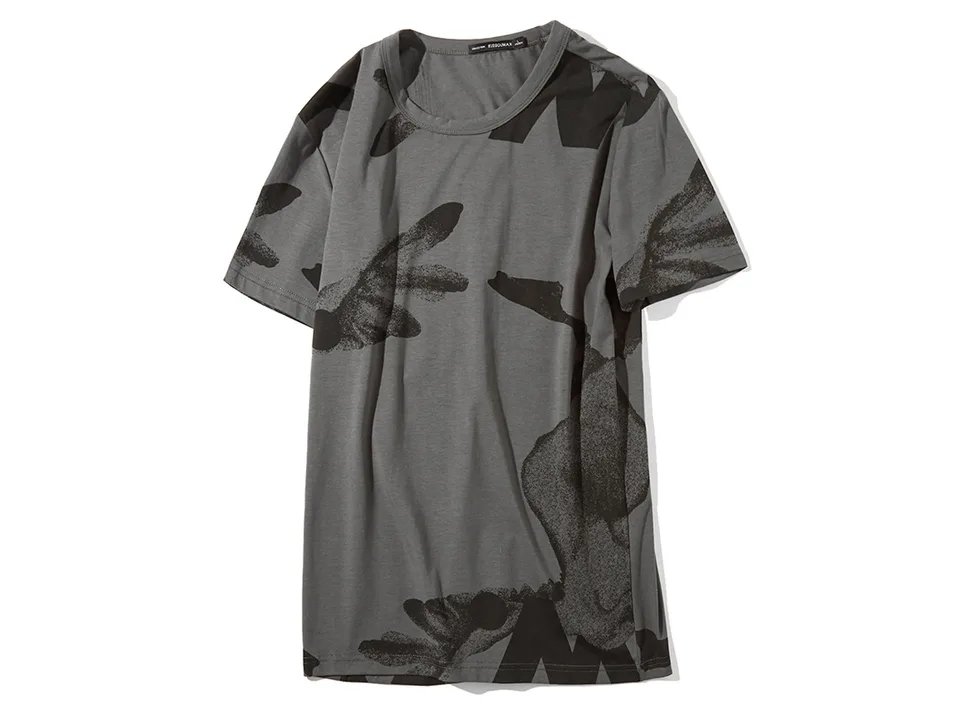 A grey t-shirt with a black abstract print laid flat.