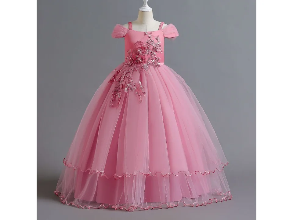 A pink formal dress for girls on a mannequin.