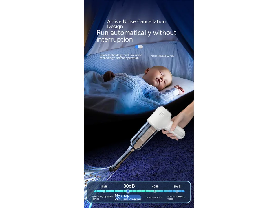 Handheld vacuum cleaner being used to clean near a sleeping baby, illustrating low noise levels.