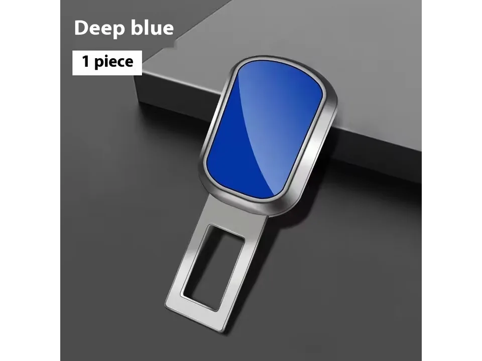 A blue car seat belt buckle extender plug.