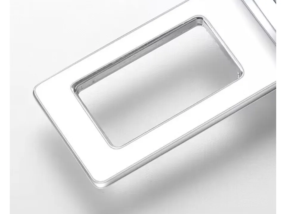 Close-up of the metal slot on the seat belt extender.