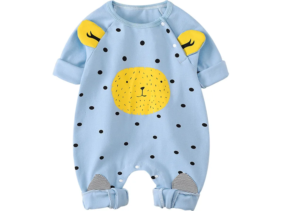 Blue infant jumpsuit with yellow animal face graphic and polka dots, isolated on white.