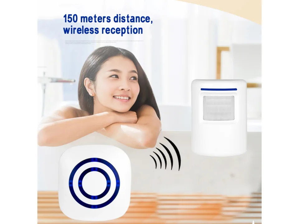Wireless motion sensor doorbell and receiver in a home setting.