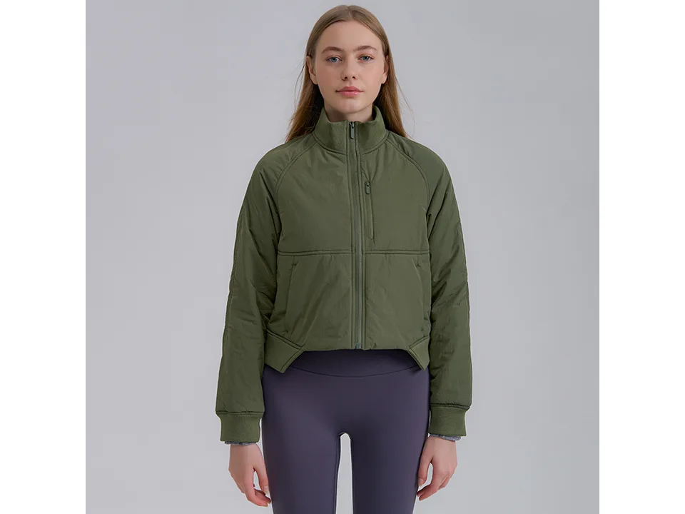 Model wearing an olive green athletic full-zip jacket.