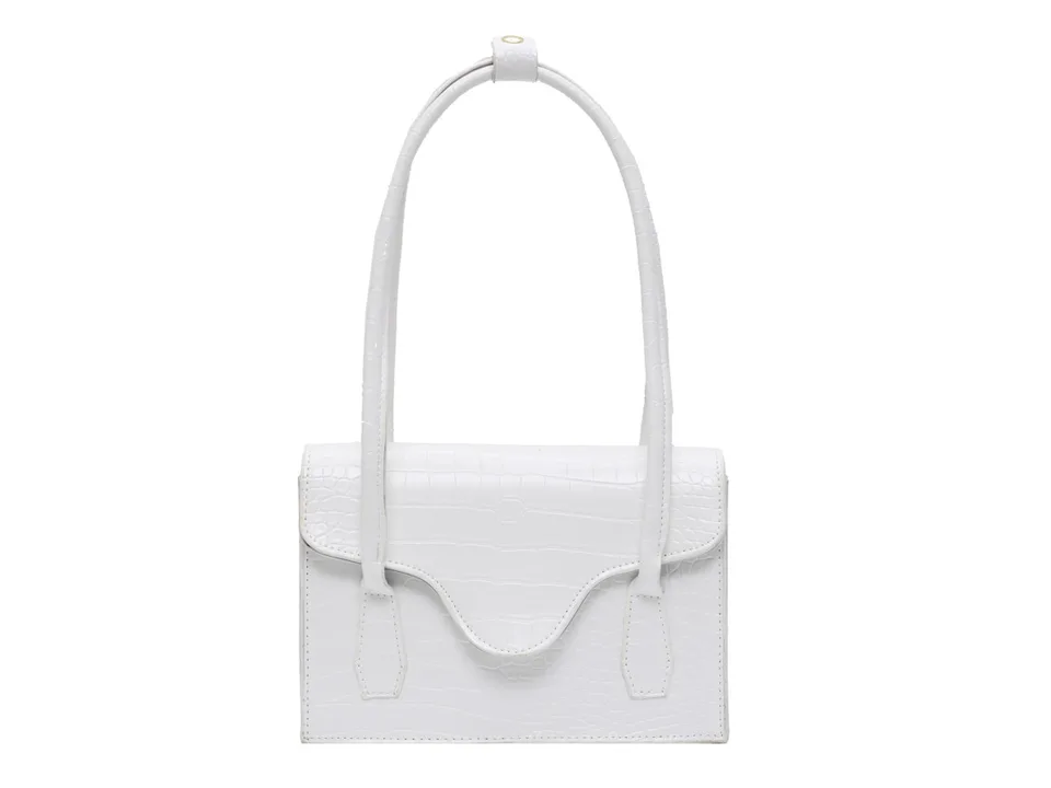 White crocodile pattern shoulder bag on a white background.